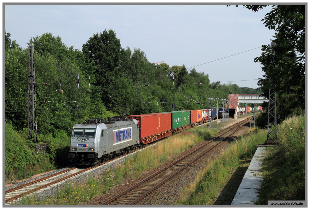 386 030